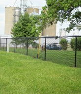 Photo of a black chainlink fence.