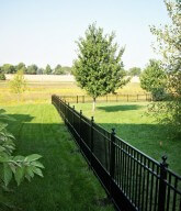Photo of a residential picket fence.