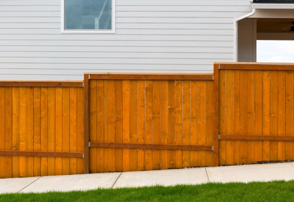 Stained wood fencing in Illinois used for backyard privacy
