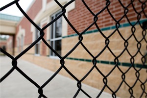 A commercial chain link fence installed by Hohulin Fence in Central Illinois
