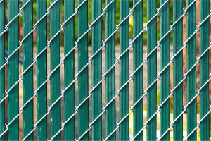 Privacy slats installed into chain link to make Privacy Fencing in Central Illinois